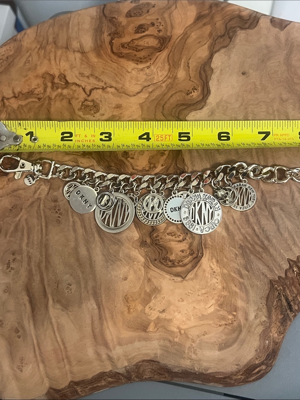 DKNY Gold-Tone Charm Bracelet with Multiple Logo Discs - Picture 5 of 5